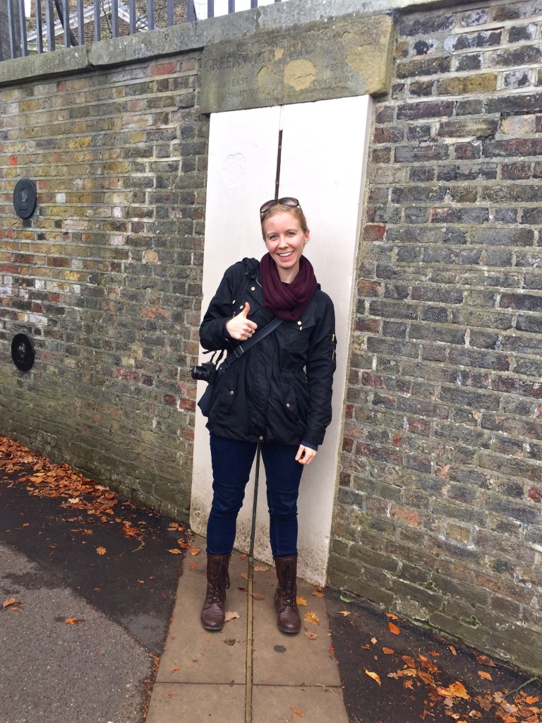 Standing on either side of the Greenwich Meridian Line